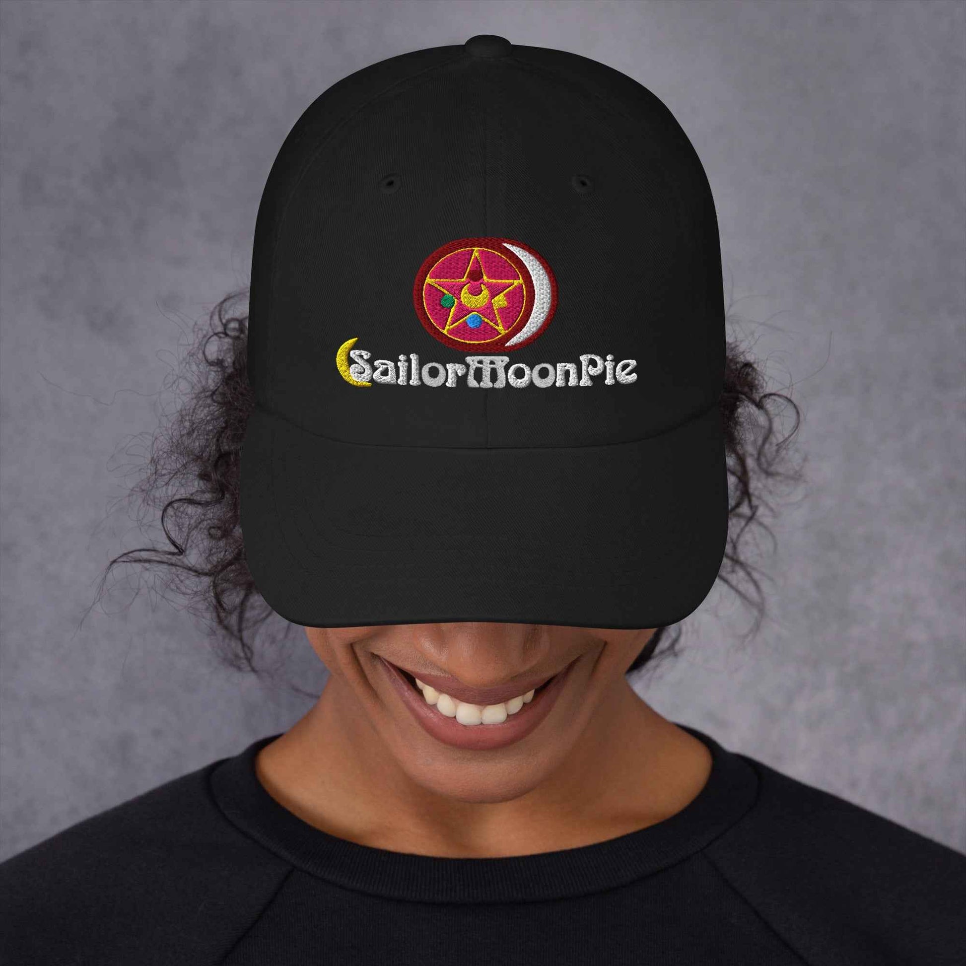 Black Sailor MoonPie Dad Hat by Appetite Apparel featuring embroidered Sailor Moon design and adjustable strap