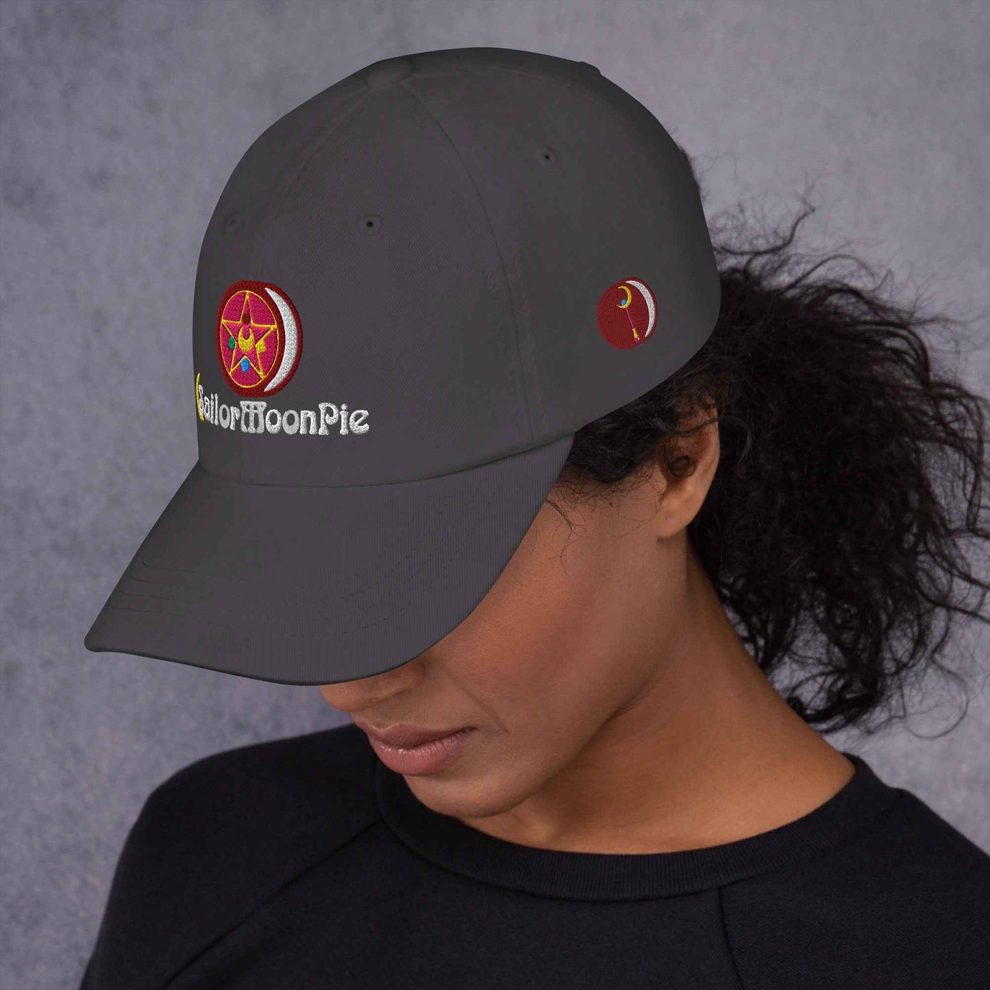 Black Sailor MoonPie Dad Hat by Appetite Apparel featuring embroidered Sailor MoonPie logo and adjustable strap.