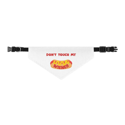 Pet dog wearing Appetite Apparel "Don’t Touch My Weiner" pet bandana collar with playful design and adjustable collar strap.