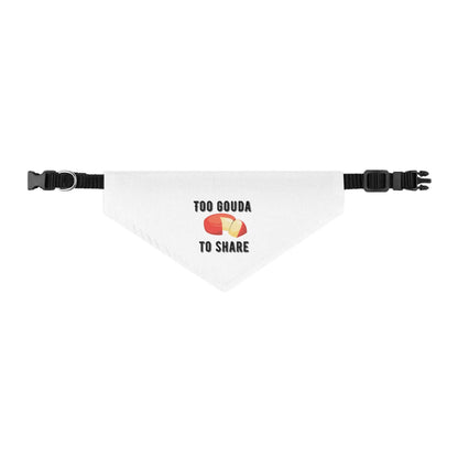 Pet dog wearing Appetite Apparel's Too Gouda To Share pet bandana collar with cheese and text design on a white background.